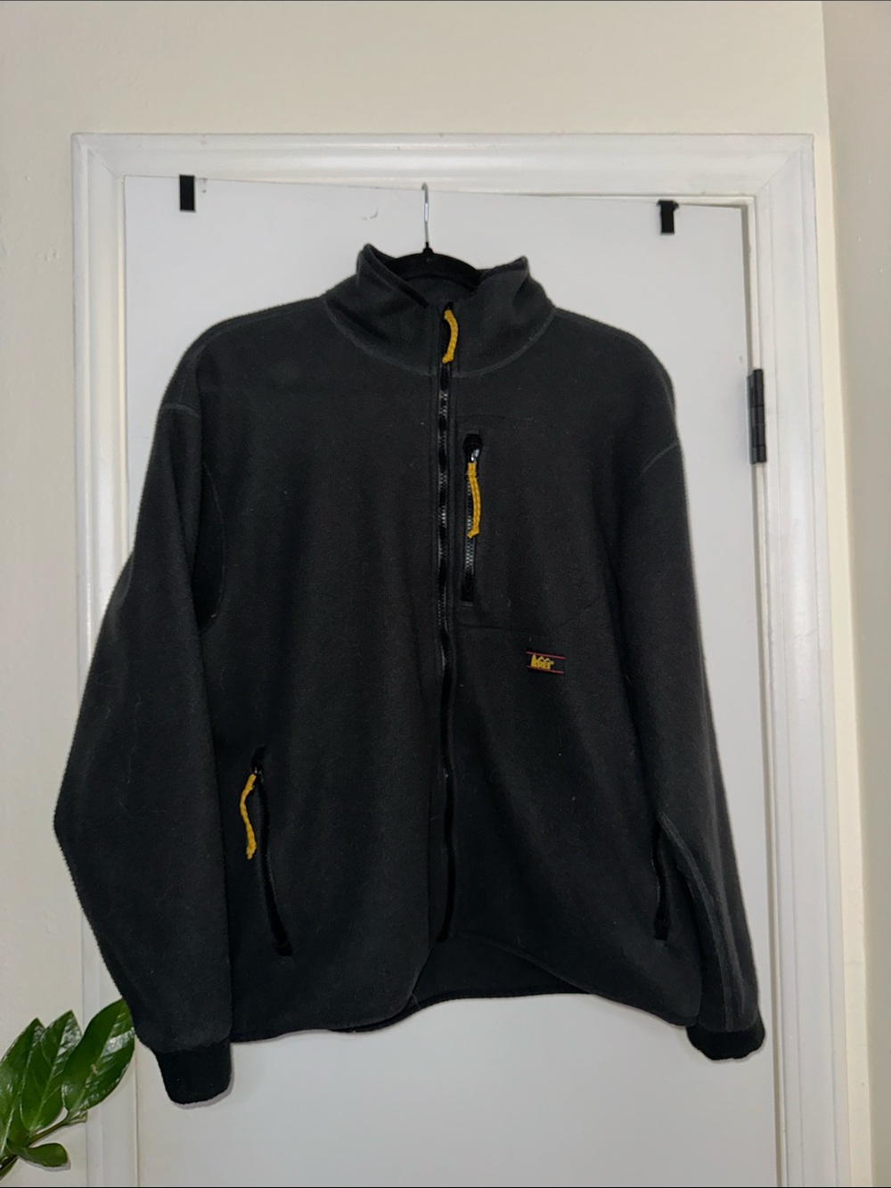 REI Black Fleece Jacket with Yellow Zipper Accents
